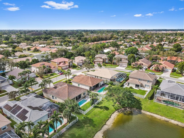 aerial view with a water view and a residential view