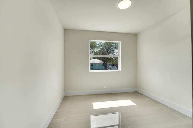 view of tiled spare room