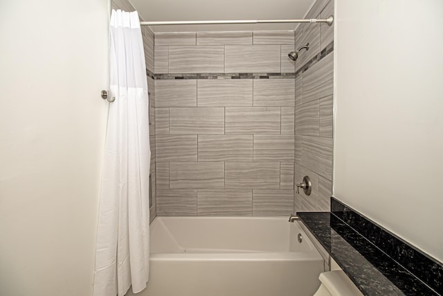 bathroom with shower / bathtub combination with curtain