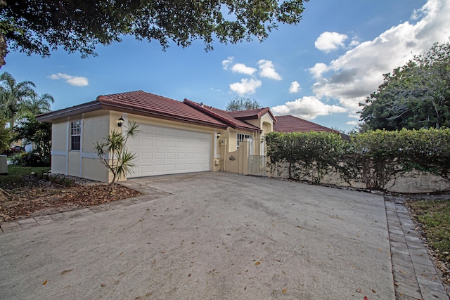 view of front of home with a garage