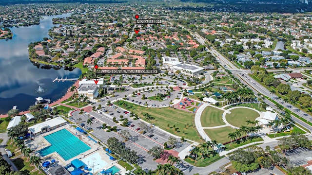 birds eye view of property featuring a water view