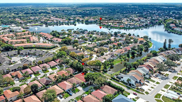 bird's eye view with a water view