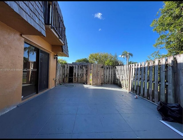 view of patio with fence