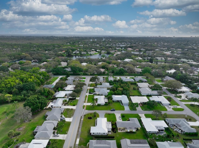 aerial view with a water view and a residential view