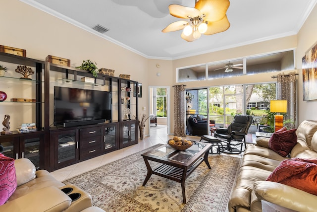 tiled living room featuring ornamental molding and ceiling fan