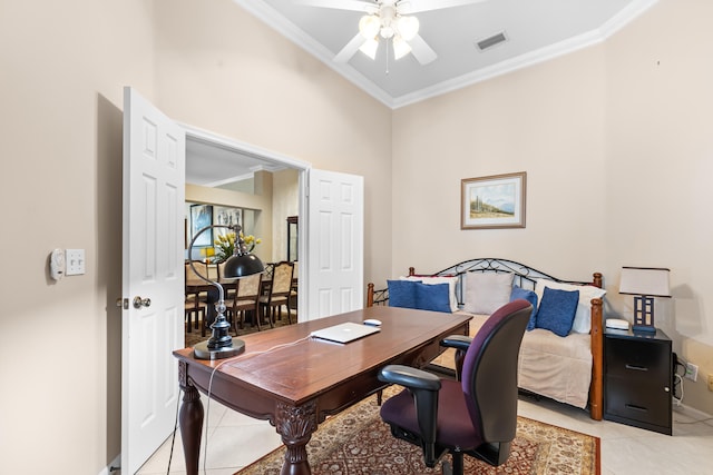 office area with crown molding, ceiling fan, and light tile patterned flooring