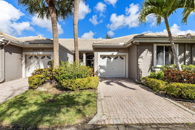 view of front of home with a garage