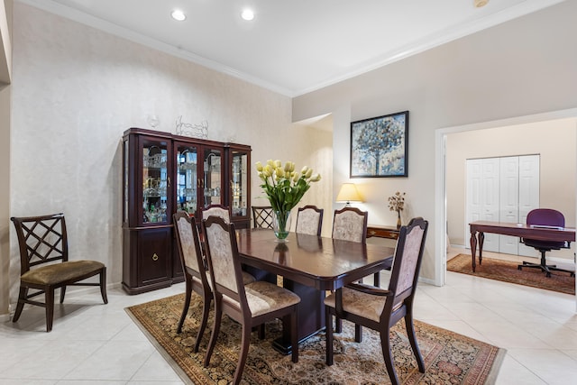 tiled dining room with ornamental molding