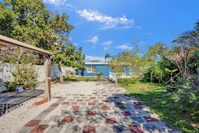 view of patio with fence