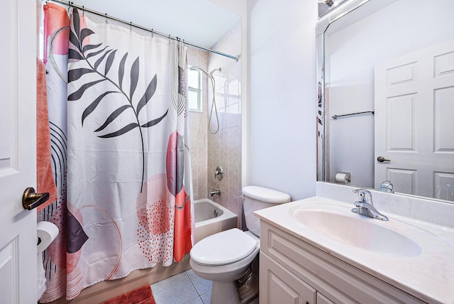 full bathroom with tile patterned floors, vanity, toilet, and shower / bath combo with shower curtain