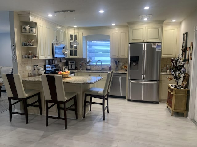 6247 Red Cedar Cir, Greenacres, FL 33463 - dining room featuring recessed lighting, a textured ceiling, visible vents, and light wood-style flooring