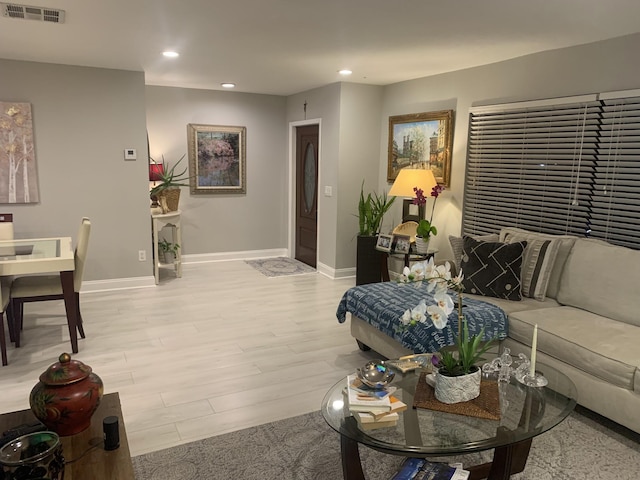 living room featuring light wood-type flooring