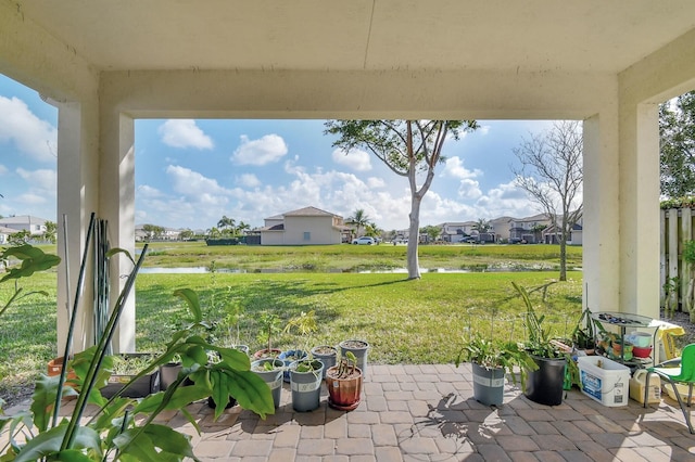 view of patio featuring a water view