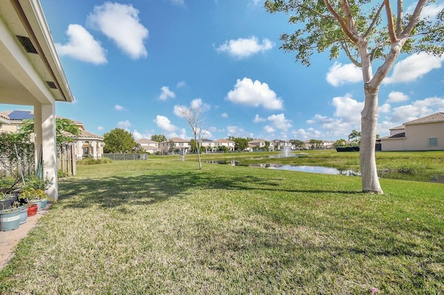 view of yard with a water view