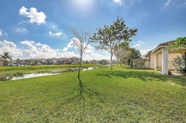 view of yard with a water view