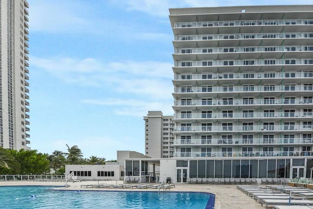 view of swimming pool with a patio area