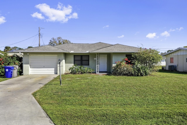 single story home featuring central AC, a garage, and a front lawn