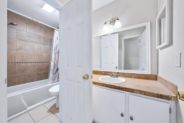 full bathroom with vanity, toilet, tile patterned flooring, and shower / bath combo