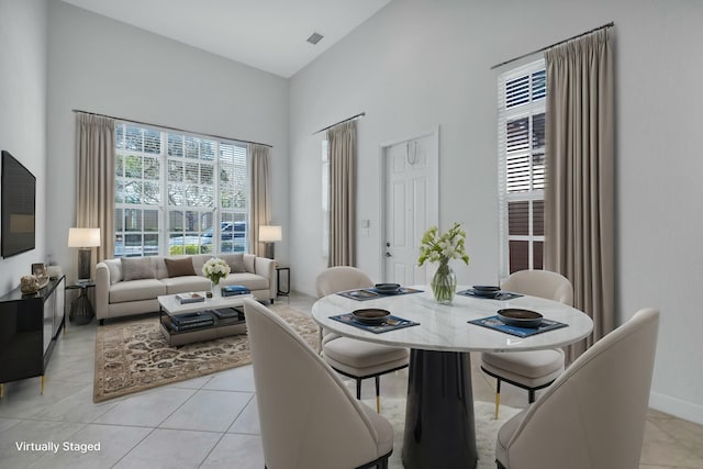 dining space with light tile patterned floors