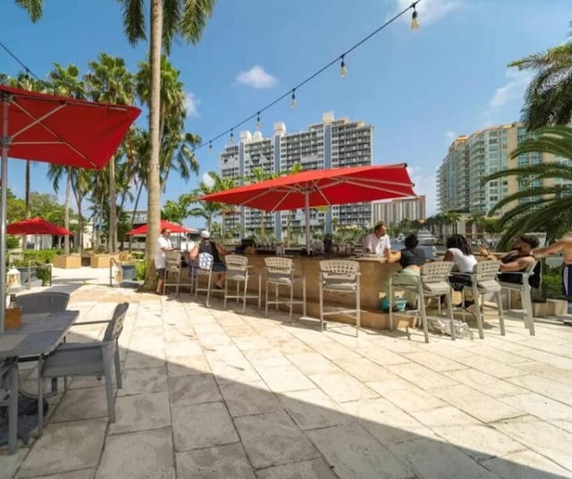 view of property's community featuring a patio