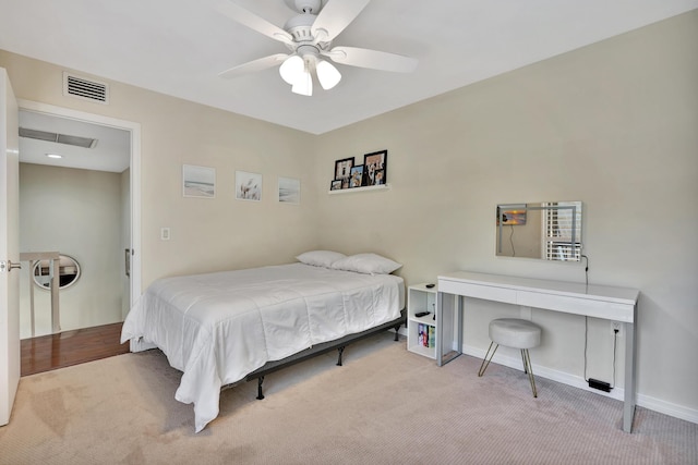 carpeted bedroom featuring ceiling fan