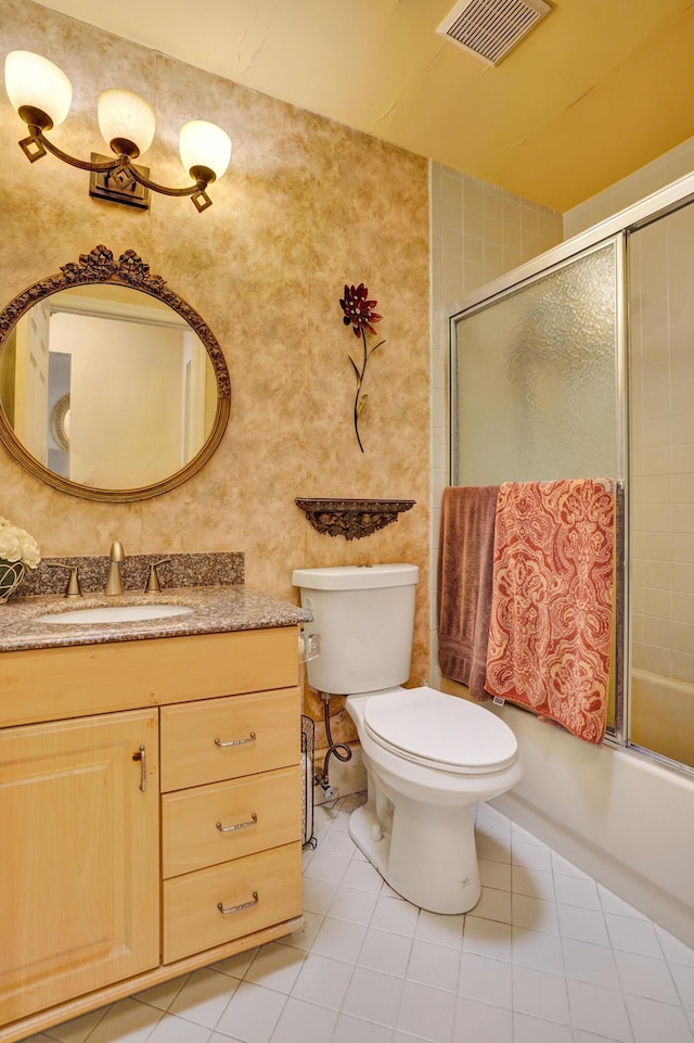 full bathroom with tile patterned flooring, visible vents, vanity, and toilet