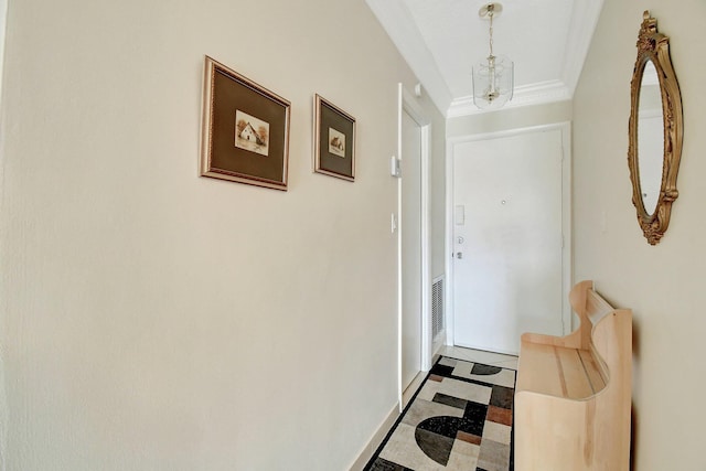 entryway with crown molding