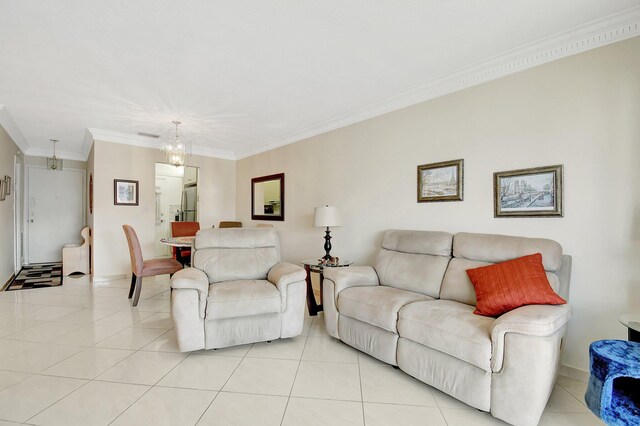 living room featuring light tile patterned flooring, ornamental molding, and a notable chandelier