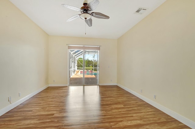 unfurnished room with ceiling fan and light hardwood / wood-style flooring