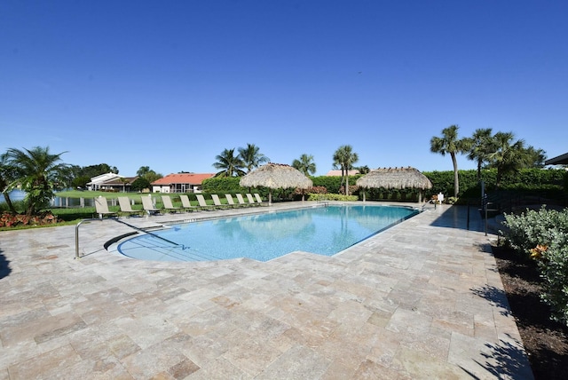 view of swimming pool featuring a patio