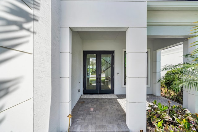 doorway to property featuring french doors