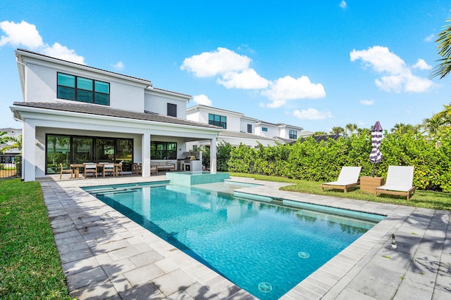 view of swimming pool with a patio