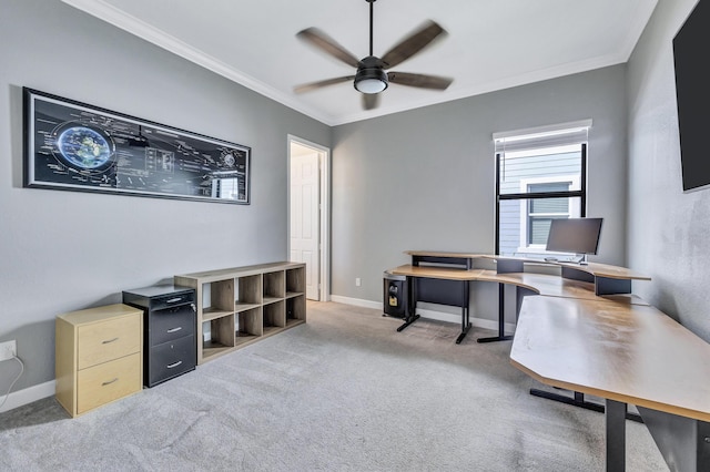 home office featuring crown molding, light carpet, and ceiling fan