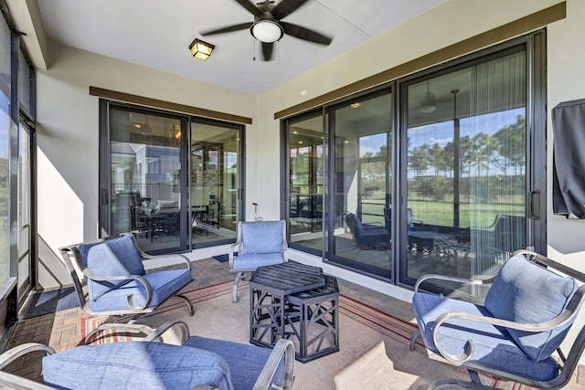 view of patio featuring ceiling fan