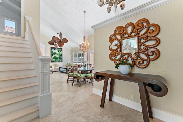 dining space with plenty of natural light, vaulted ceiling with beams, wooden ceiling, and a chandelier