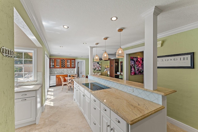 kitchen featuring white cabinetry, pendant lighting, ornamental molding, and black electric cooktop