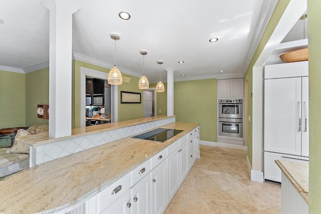 kitchen featuring pendant lighting, black electric stovetop, white cabinets, and double oven