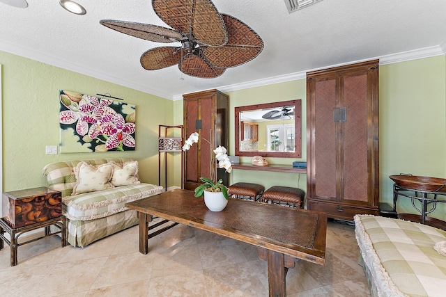 living room featuring crown molding, light tile patterned flooring, and ceiling fan