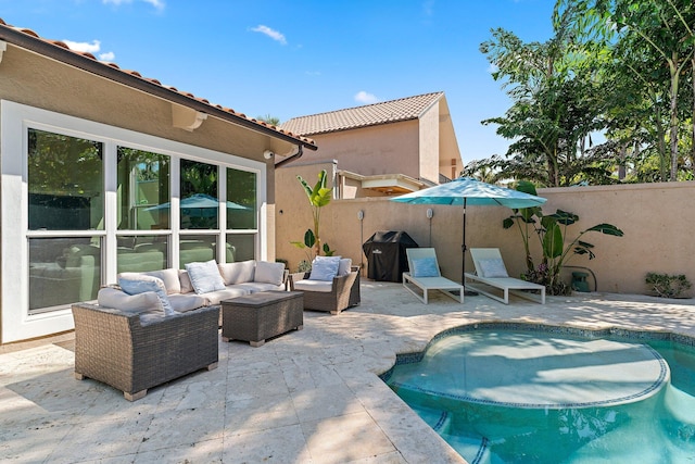 view of patio / terrace featuring an outdoor hangout area and grilling area