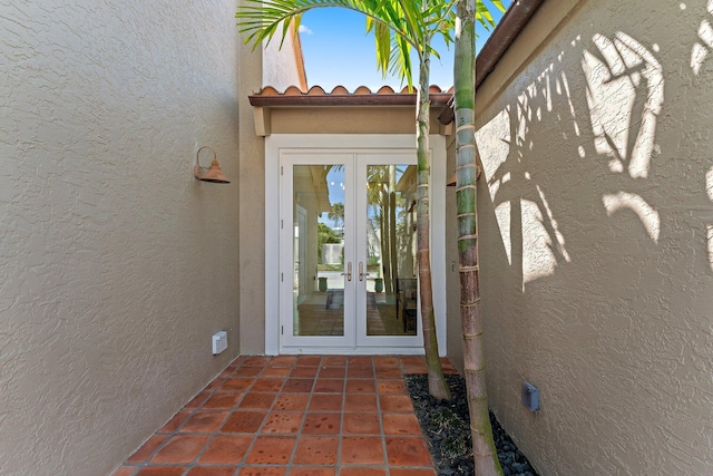 doorway to property featuring french doors