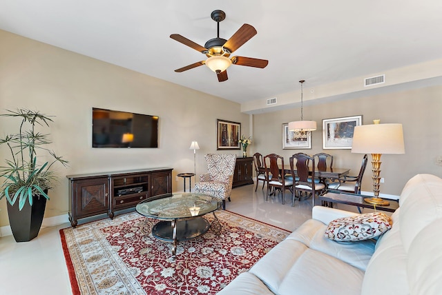 155 Ocean Ave Unit 603, Palm Beach Shores, FL 33404 - living area featuring ceiling fan and baseboards