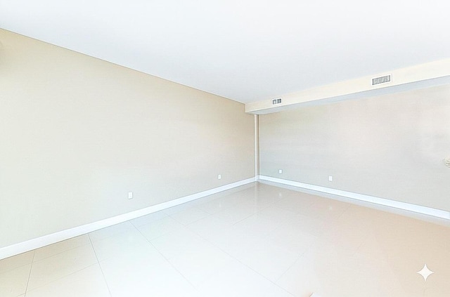 155 Ocean Ave Unit 603, Palm Beach Shores, FL 33404 - unfurnished room with baseboards
