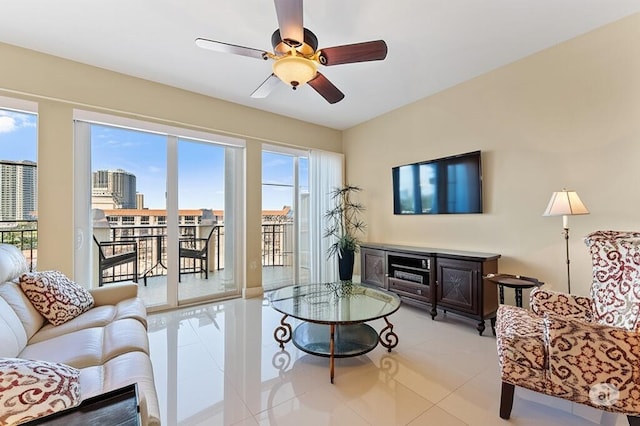 155 Ocean Ave Unit 603, Palm Beach Shores, FL 33404 - living room with tile patterned floors and a ceiling fan