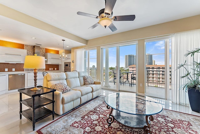 155 Ocean Ave Unit 603, Palm Beach Shores, FL 33404 - living area with a ceiling fan, light tile patterned floors, a chandelier, a view of city, and recessed lighting