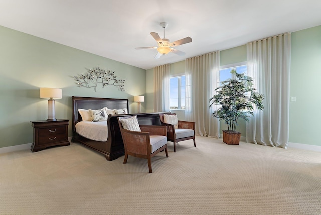 155 Ocean Ave Unit 603, Palm Beach Shores, FL 33404 - bedroom with light colored carpet, baseboards, and ceiling fan