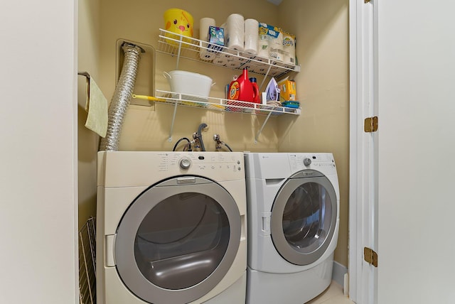 laundry area with washer and dryer