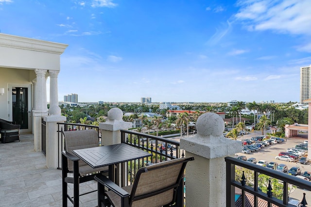 balcony featuring a city view