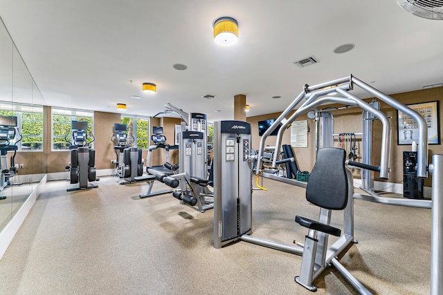 gym with visible vents and baseboards