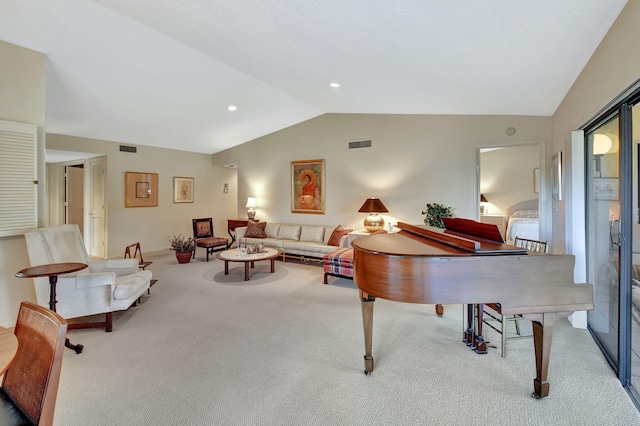 rec room featuring lofted ceiling and light colored carpet