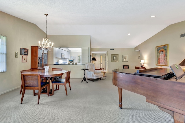 carpeted dining space with lofted ceiling and an inviting chandelier